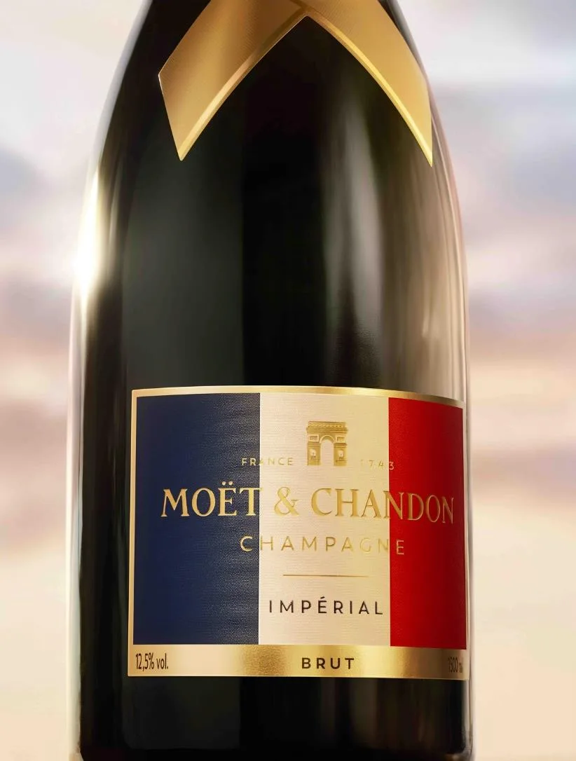 Šampano butelis su Prancūzijos vėliava