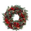 Рождественский венок с красными украшениями